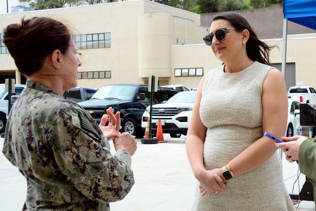 Two Woman Speaking